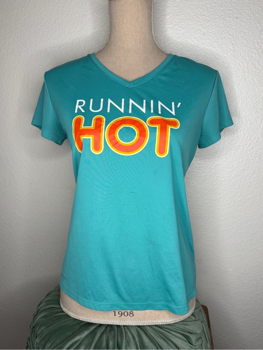 Running Hot Teal Graphic V‑Neck Tee